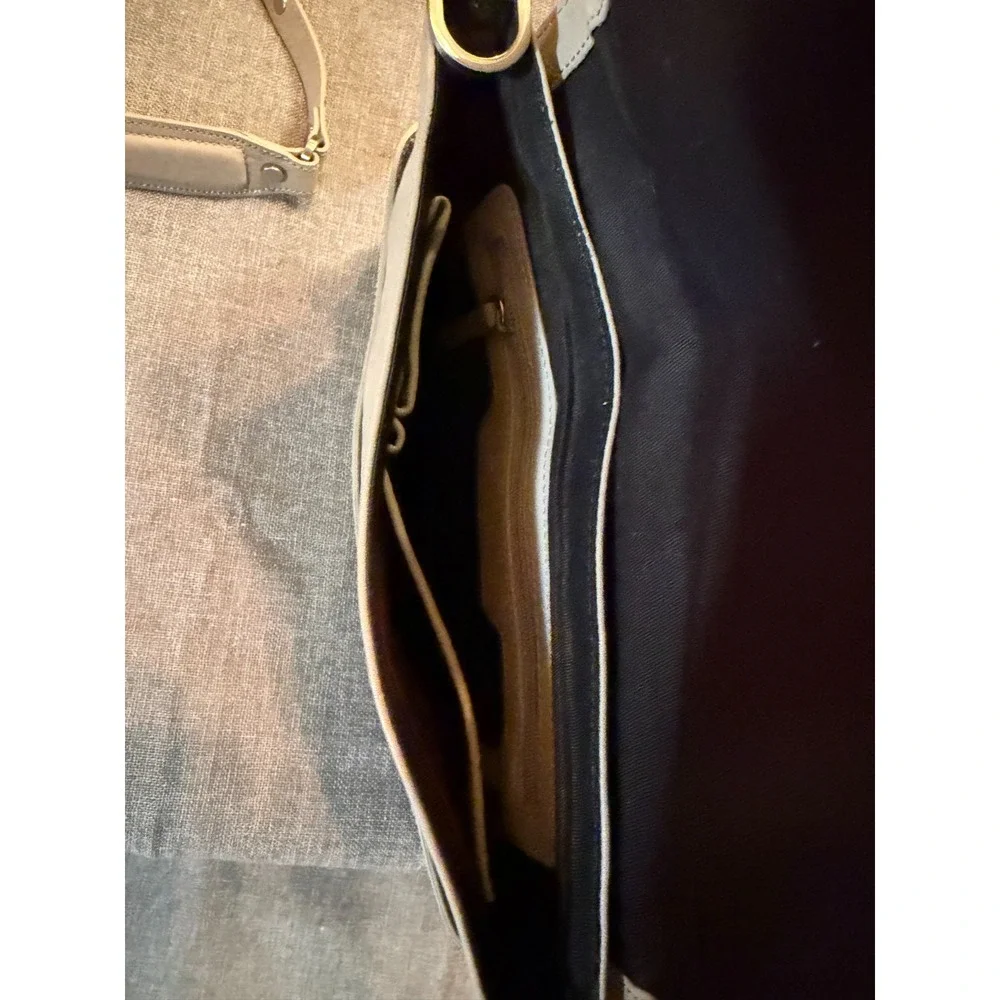 Beautiful Cream leather clutch with detachable shoulder strap by Kenneth Cole
